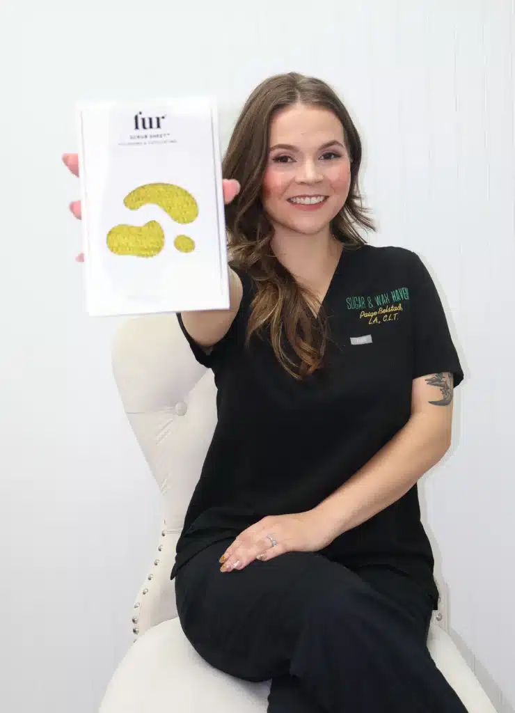 Sugar & Wax Haven Beauty Specialist With Skincare Product